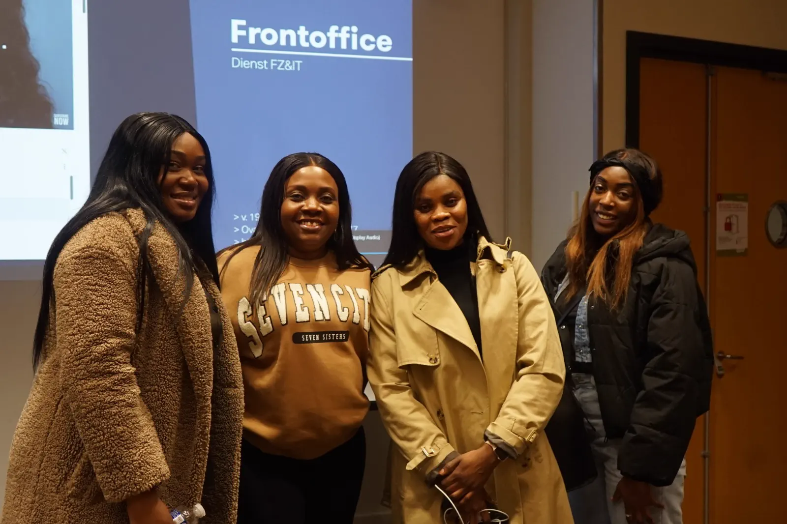 A small group of students meeting together on campus.