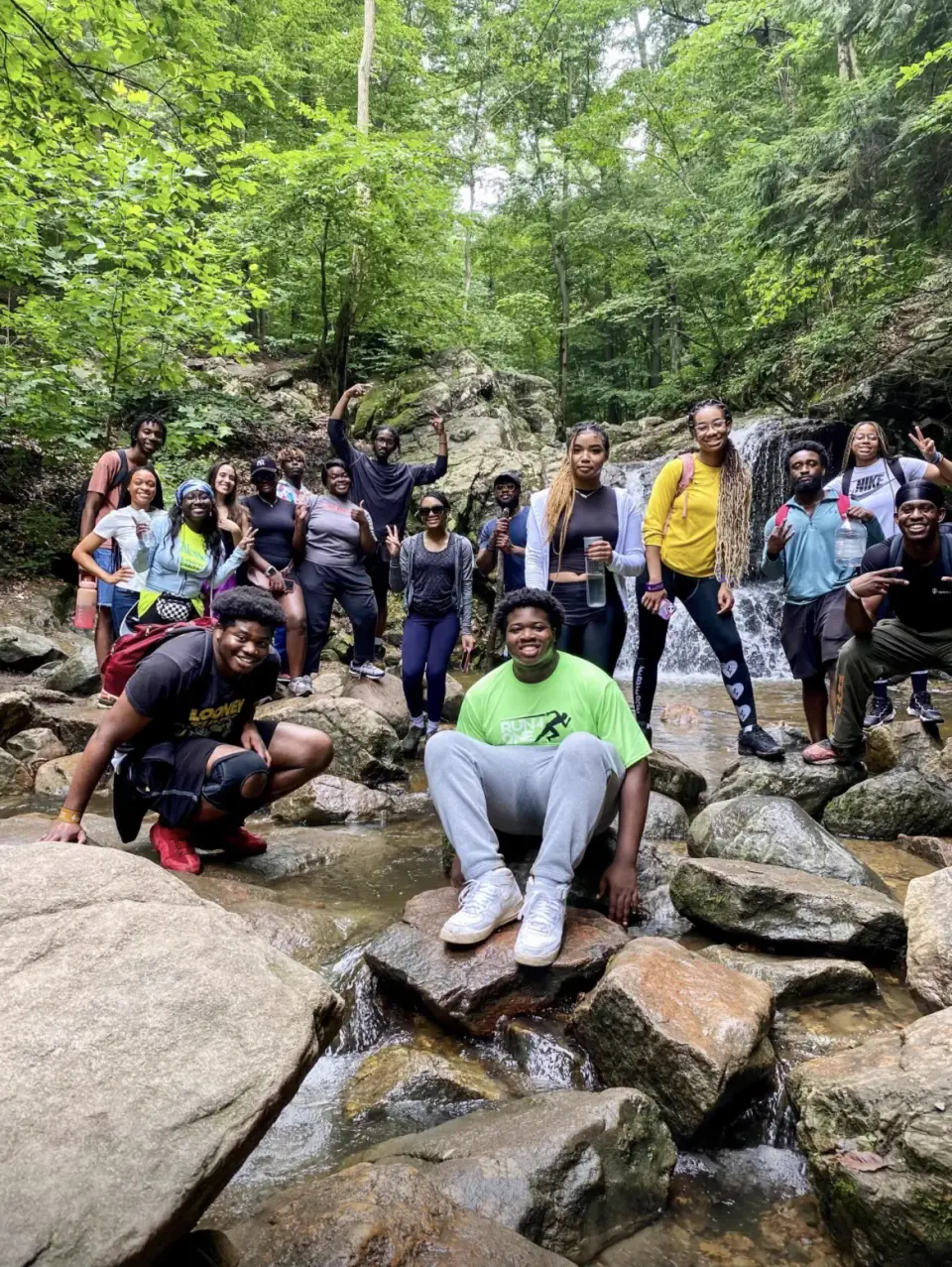 Students outdoors together on a hike.
